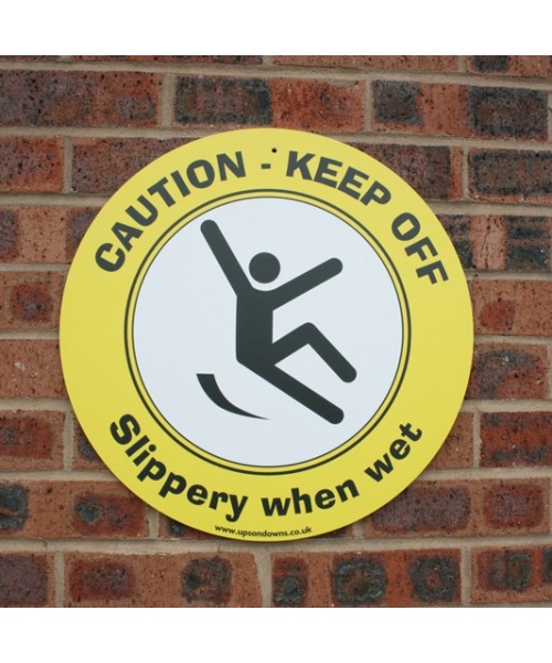 CAUTION slippery when wet yellow circle